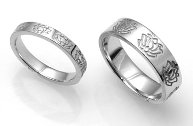1. Lotus Motif Wedding Band Set