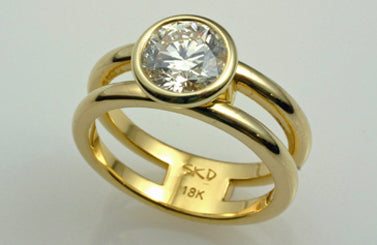 1. One-Of-A-Kind Double Band Diamond Solitaire Ring